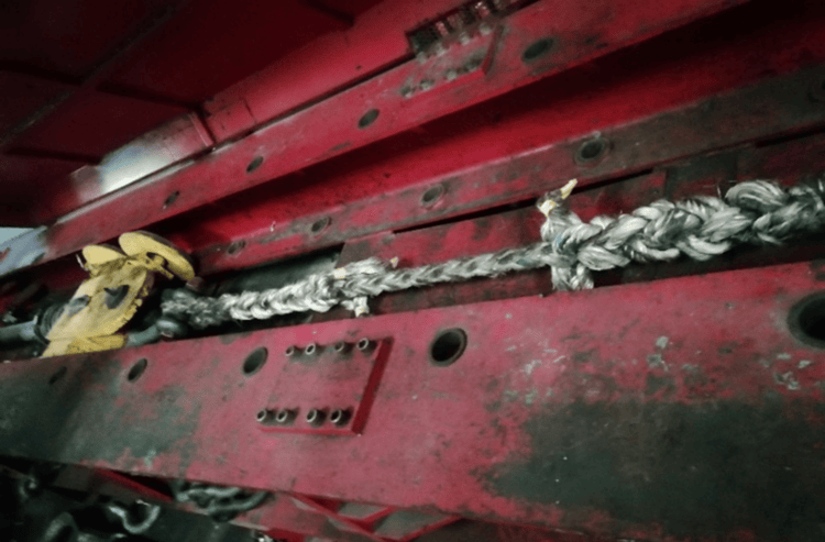Synthetic rope being tested under high tension